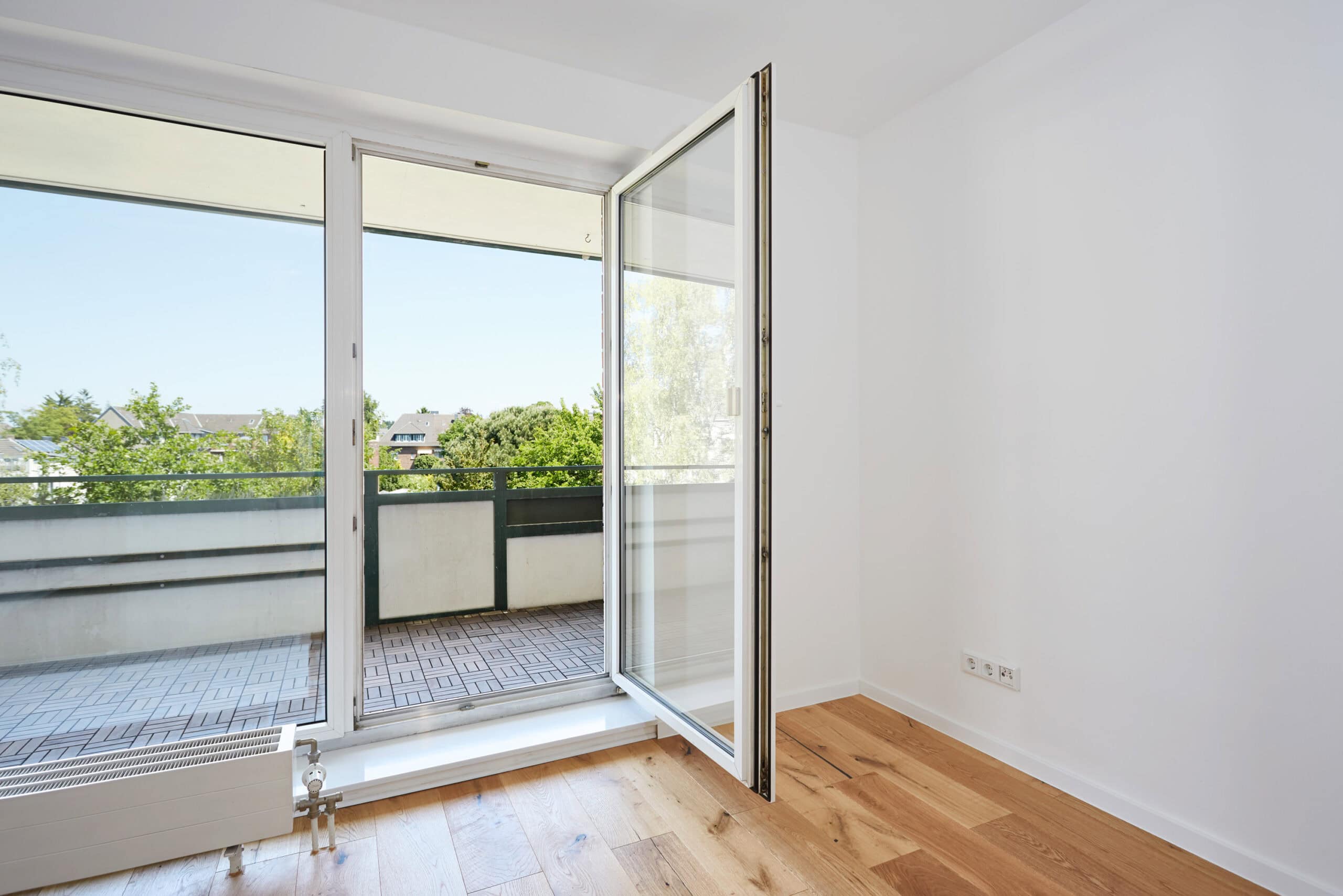 3-Zimmerwohnung Neuss Stadionviertel – Zimmer mit Eichenparkett